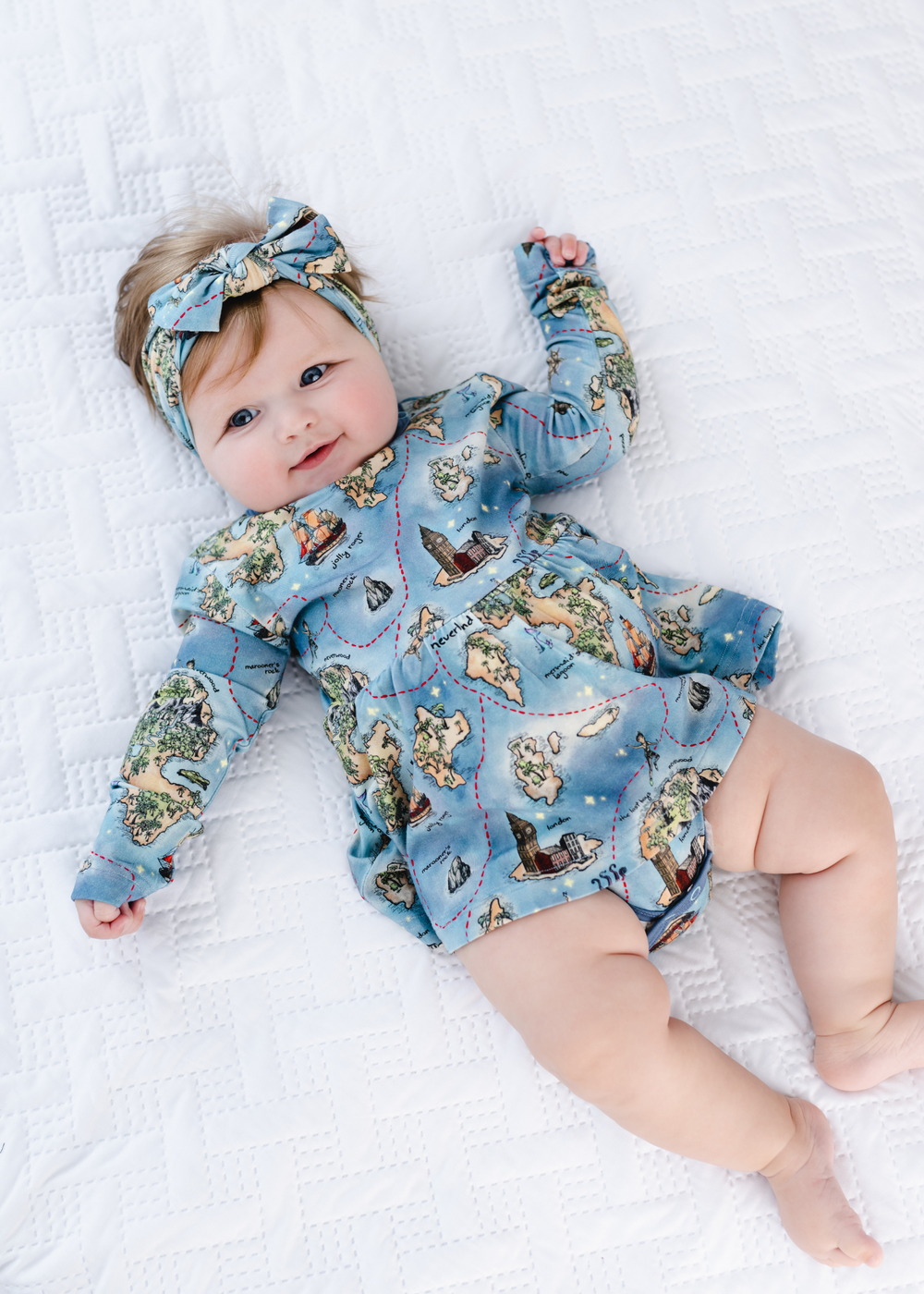 Neverland bamboo long sleeve baby dress front. Peter Pan Map bamboo long sleeve baby dress front.