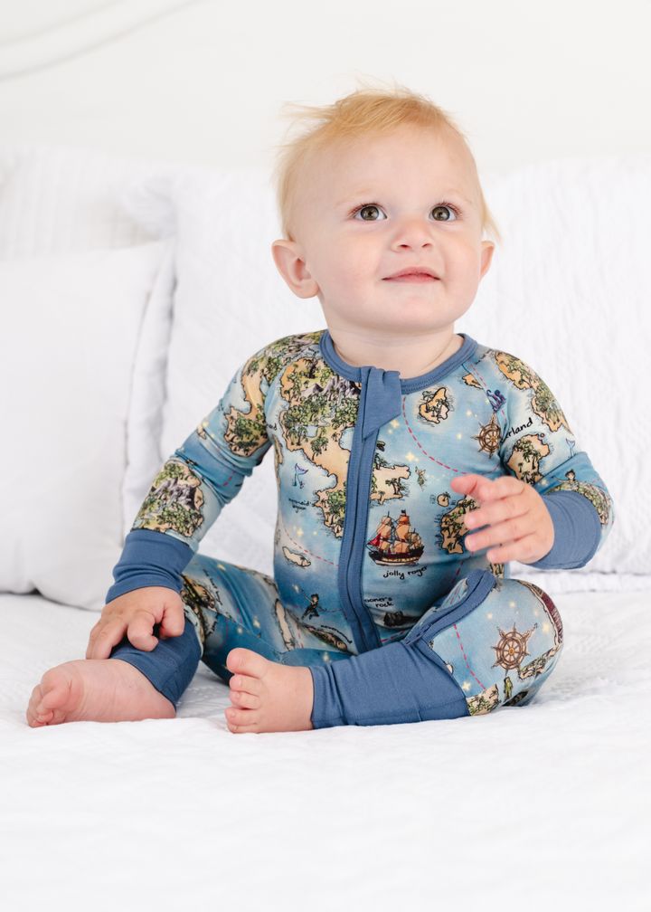 Neverland bamboo sleeper model sitting down. Peter Pan Map bamboo zippered sleeper model sitting down.