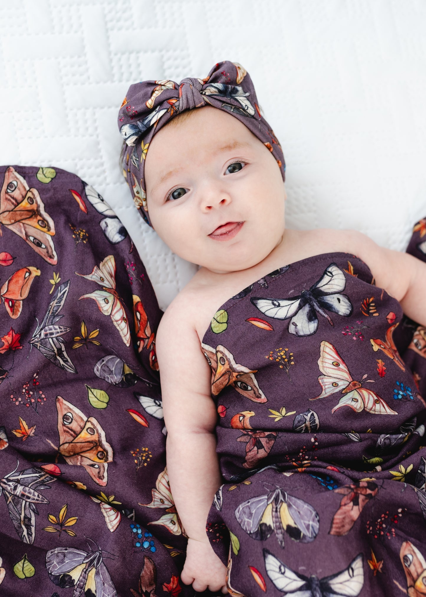 The Moths Plum Swaddle Blanket