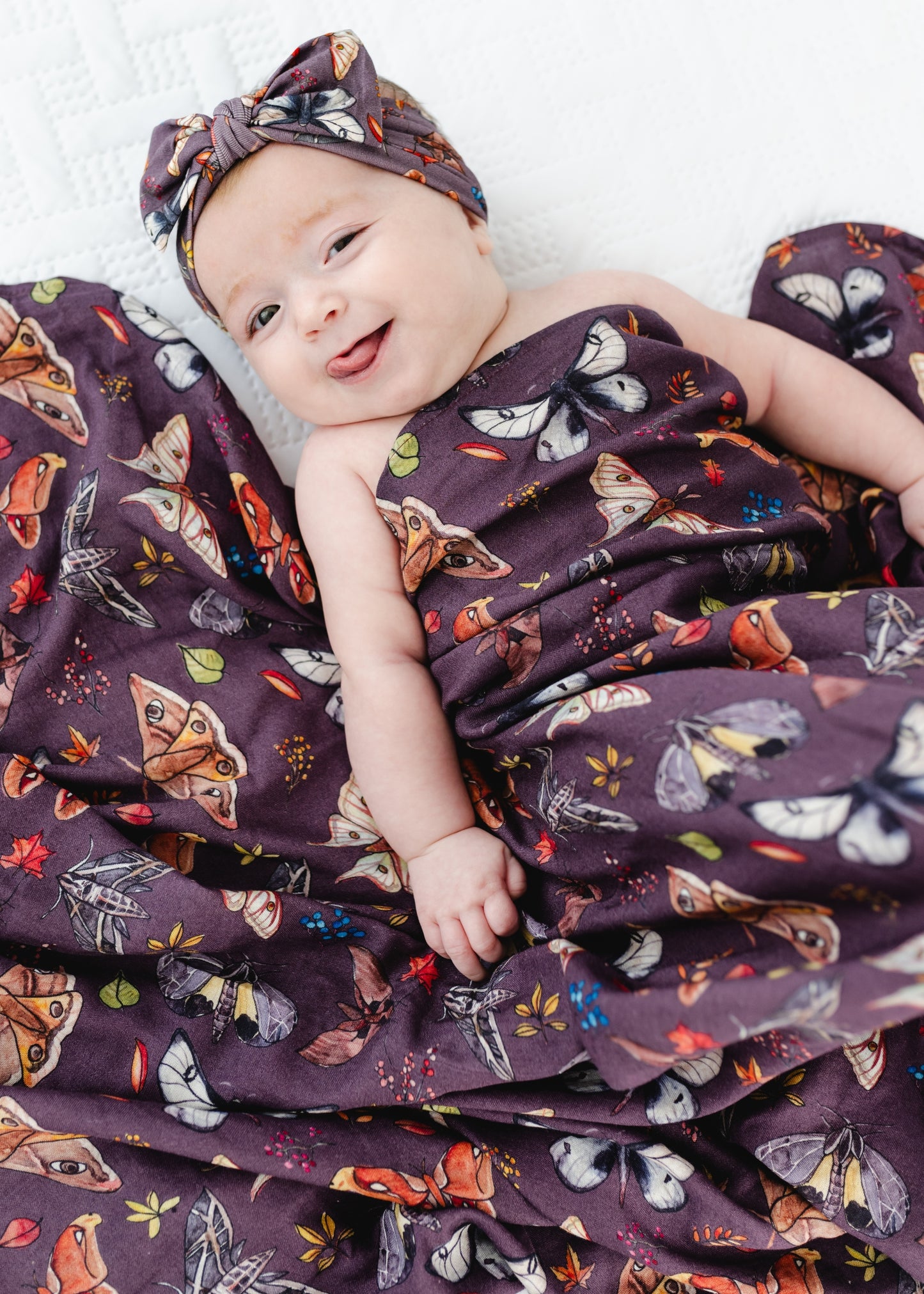 The Moths Plum Swaddle Blanket