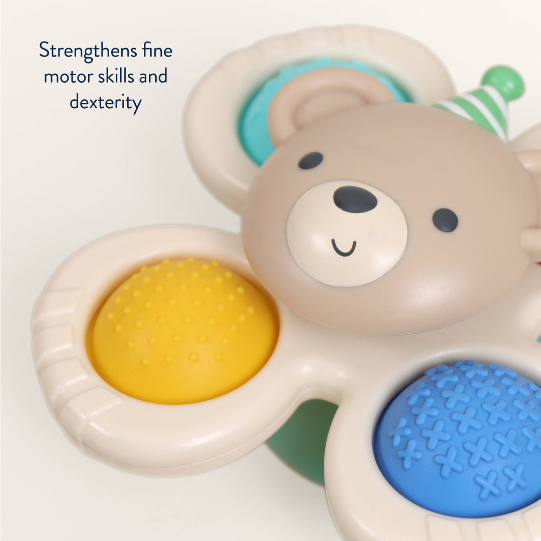 Itzy Pop &amp; Whirl™ Circus Bear Toy