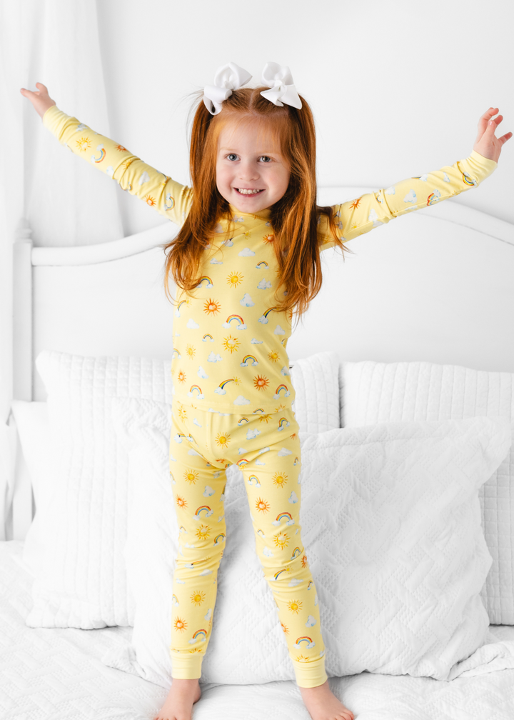 Sunshine and Rainbows yellow colored pajama set for toddlers and kids, made out of buttery soft bamboo fabric.