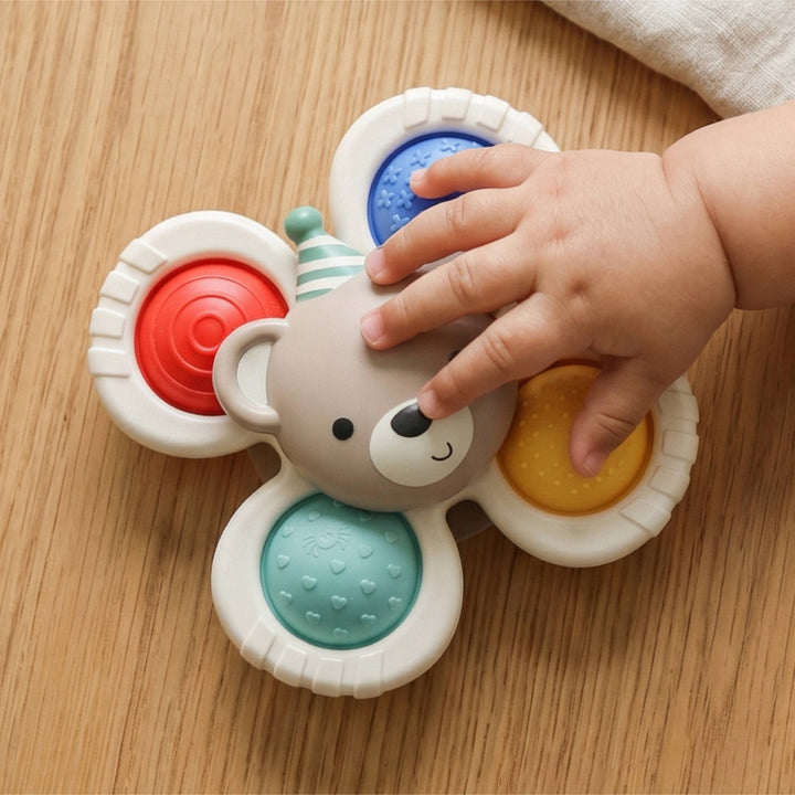 Itzy Pop &amp; Whirl™ Circus Bear Toy