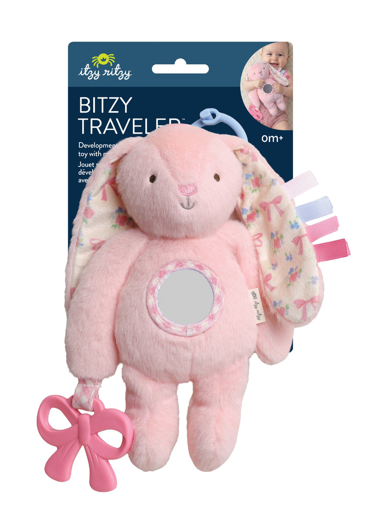 Pink plush toy with floral details and a mirror, branded 'ityzy ritzy', on a white background.
