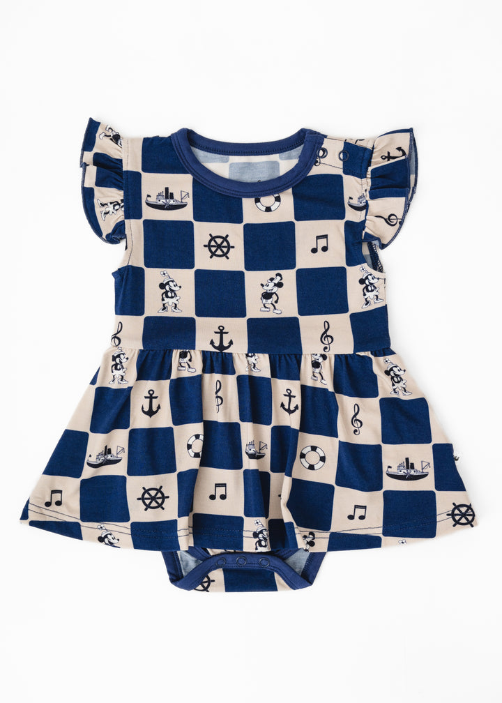 Children's dress with steamboat willie featured. 