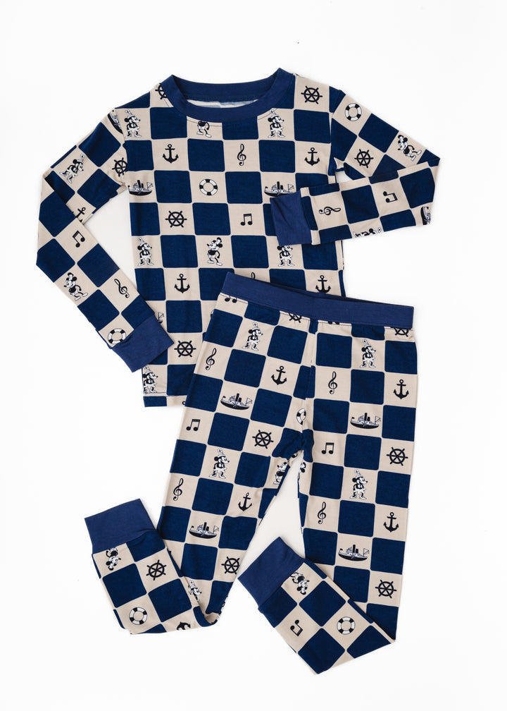 Children's pajama set with nautical pattern featuring Steamboat Willie and nautical items on a checkered background. Steamboat Willie pajama set for kids. Two piece toddler pajama set with Steamboat Willie. 